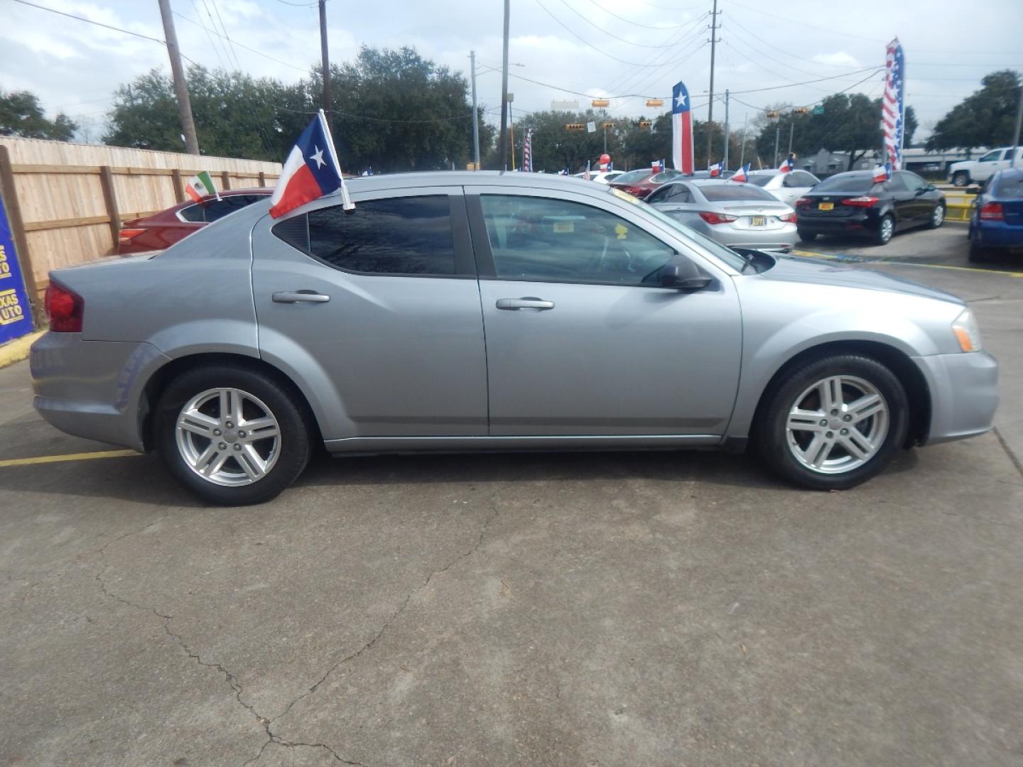 2014 SILVER DODGE AVENGER SE (1C3CDZABXEN) with an 2.4L L4 DOHC 16V engine, 4-SPEED AUTOMATIC transmission, located at 16710 Clay Rd., Houston, TX, 77084, (281) 859-7900, 0.000000, 0.000000 - Low Donw. Low Payments. - Photo#4