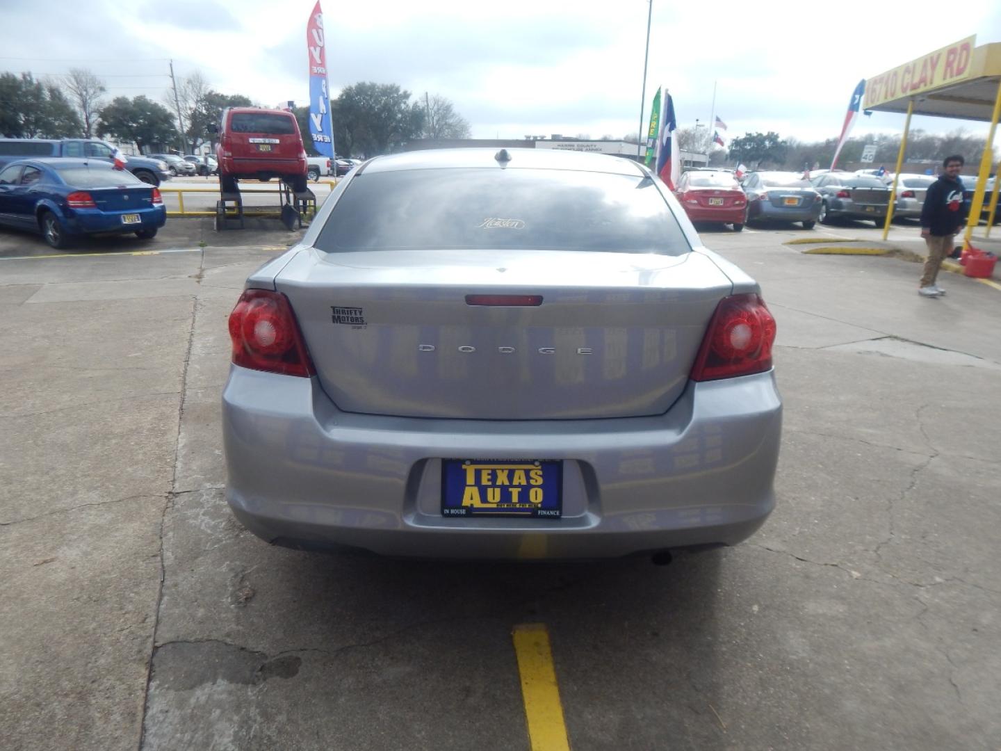 2014 SILVER DODGE AVENGER SE (1C3CDZABXEN) with an 2.4L L4 DOHC 16V engine, 4-SPEED AUTOMATIC transmission, located at 16710 Clay Rd., Houston, TX, 77084, (281) 859-7900, 0.000000, 0.000000 - Low Donw. Low Payments. - Photo#5