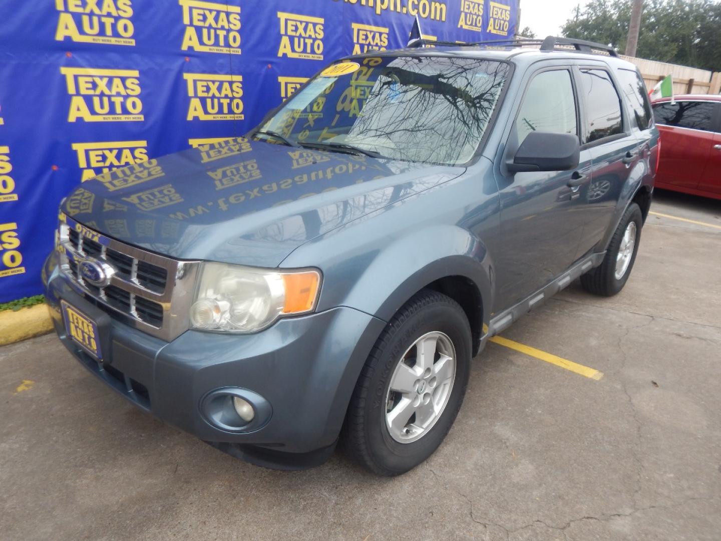 2011 BLUE FORD ESCAPE XLT FWD (1FMCU0D73BK) with an 2.5L L4 DOHC 16V engine, 6-SPEED AUTOMATIC transmission, located at 16710 Clay Rd., Houston, TX, 77084, (281) 859-7900, 0.000000, 0.000000 - Low Donw. Low Payments. - Photo#1