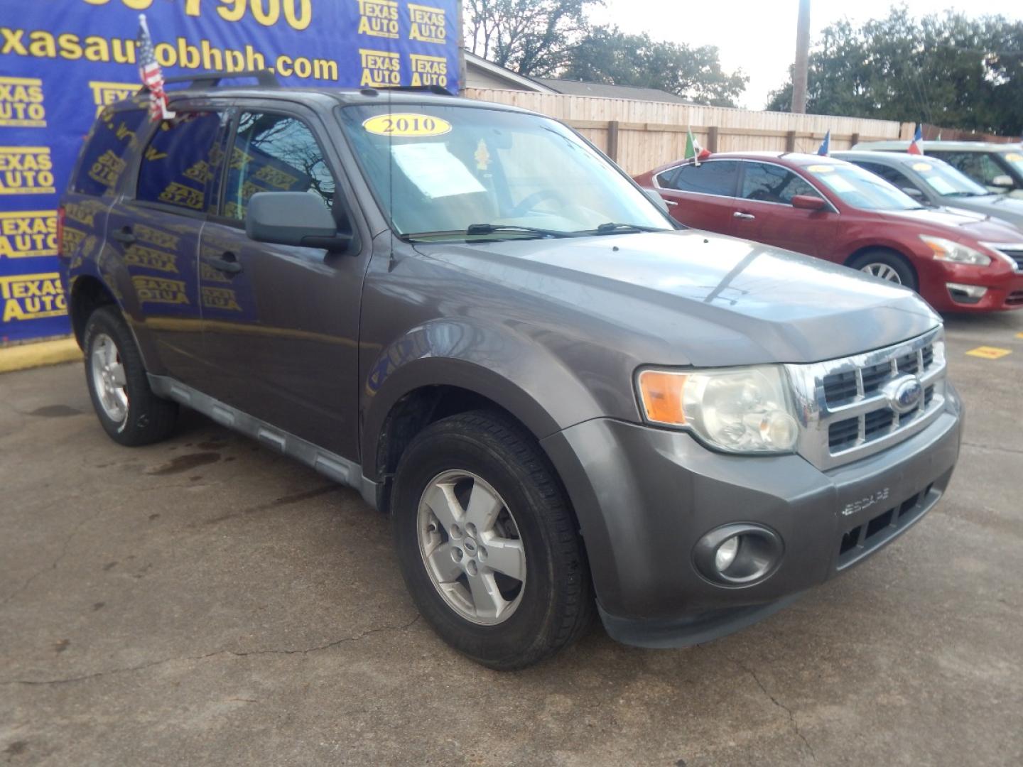 2010 GRAY FORD ESCAPE XLT FWD (1FMCU0DG0AK) with an 3.0L V6 DOHC 24V engine, 6-SPEED AUTOMATIC transmission, located at 16710 Clay Rd., Houston, TX, 77084, (281) 859-7900, 0.000000, 0.000000 - Low Donw. Low Payments. - Photo#3