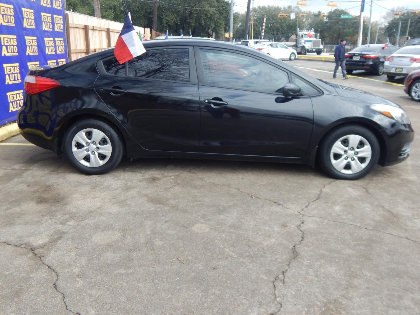 2015 BLACK Kia Forte LX (KNAFK4A64F5) with an 1.8L L4 DOHC 16V engine, located at 16710 Clay Rd., Houston, TX, 77084, (281) 859-7900, 0.000000, 0.000000 - Low Donw. Low Payments. - Photo#4