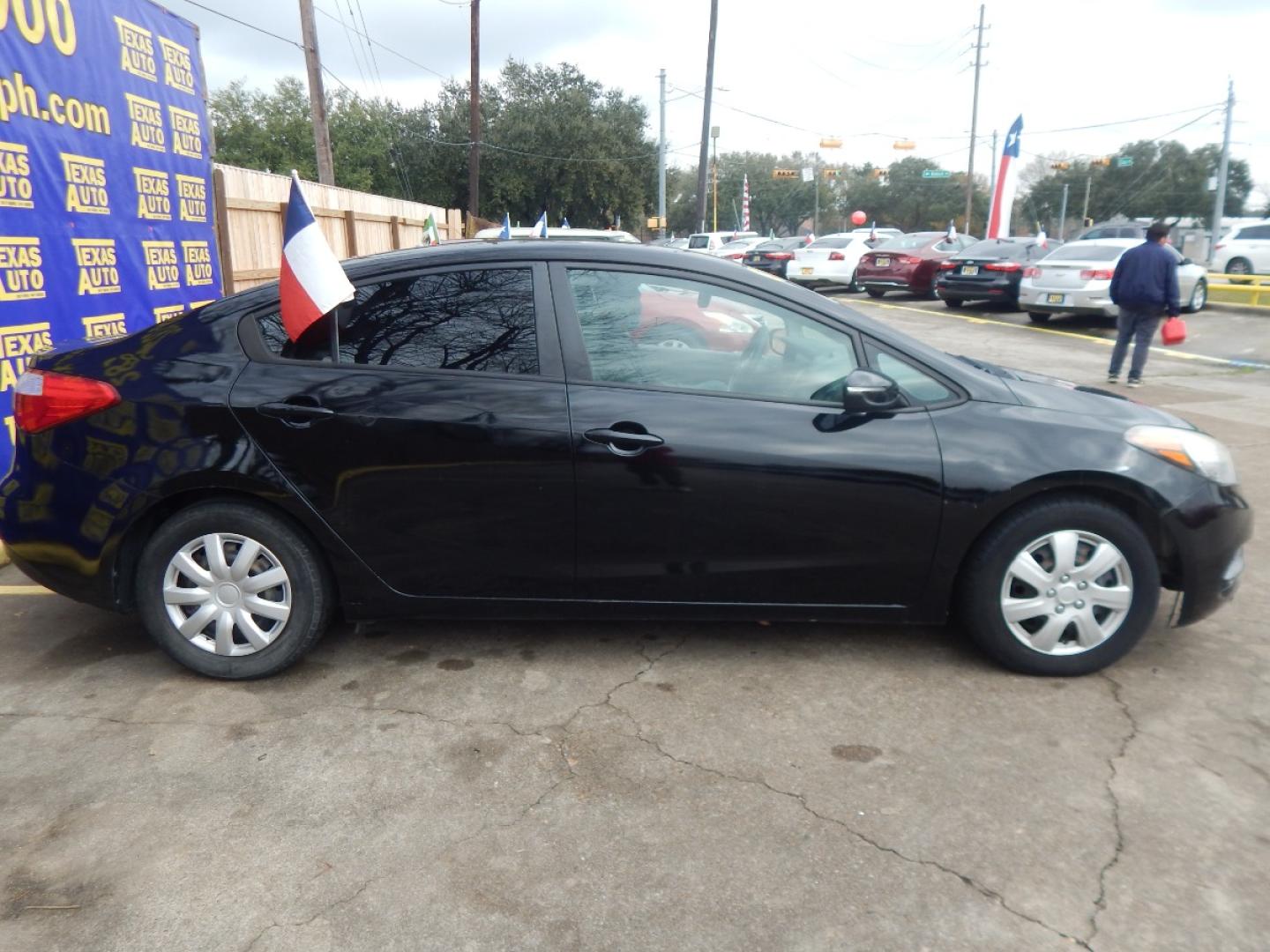 2015 BLACK Kia Forte EX (KNAFX4A64F5) with an 1.8L L4 DOHC 16V engine, 6-Speed Automatic transmission, located at 16710 Clay Rd., Houston, TX, 77084, (281) 859-7900, 0.000000, 0.000000 - Low Down. Low Payments. - Photo#4