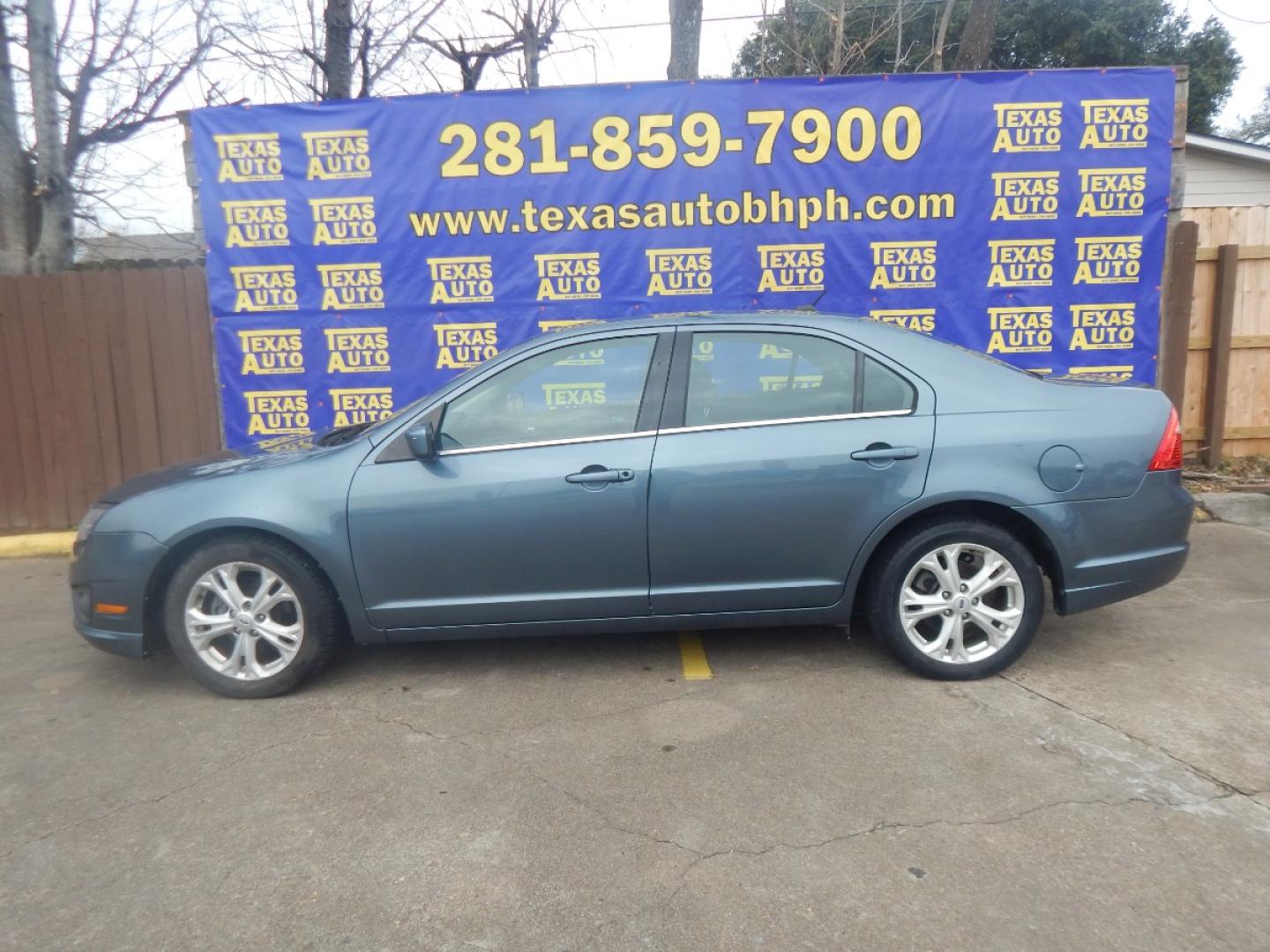 2012 BLUE Ford Fusion SE (3FAHP0HA0CR) with an 2.5L L4 DOHC 16V engine, located at 16710 Clay Rd., Houston, TX, 77084, (281) 859-7900, 0.000000, 0.000000 - Low Donw. Low Payments. - Photo#0