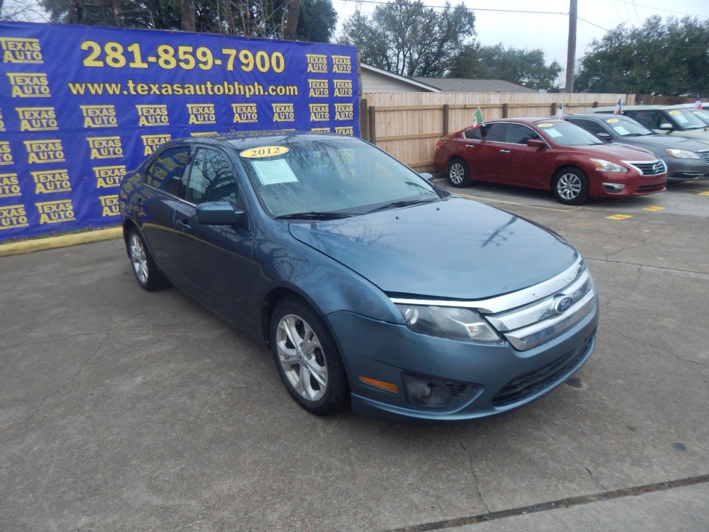 2012 BLUE Ford Fusion SE (3FAHP0HA0CR) with an 2.5L L4 DOHC 16V engine, located at 16710 Clay Rd., Houston, TX, 77084, (281) 859-7900, 0.000000, 0.000000 - Low Donw. Low Payments. - Photo#3