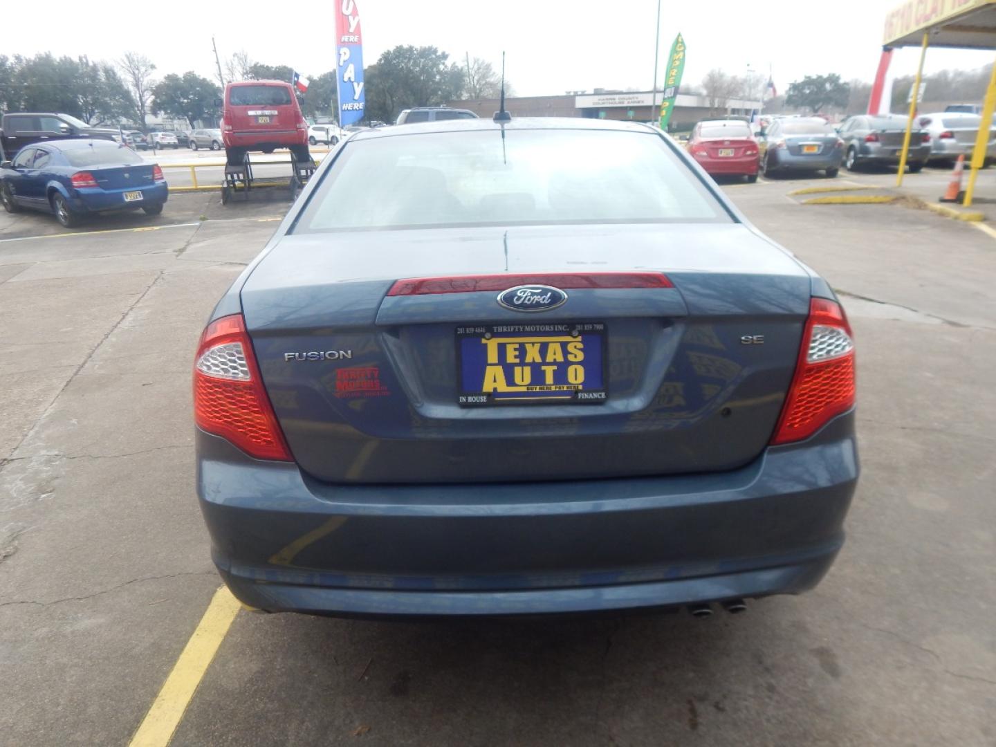 2012 BLUE Ford Fusion SE (3FAHP0HA0CR) with an 2.5L L4 DOHC 16V engine, located at 16710 Clay Rd., Houston, TX, 77084, (281) 859-7900, 0.000000, 0.000000 - Low Donw. Low Payments. - Photo#5