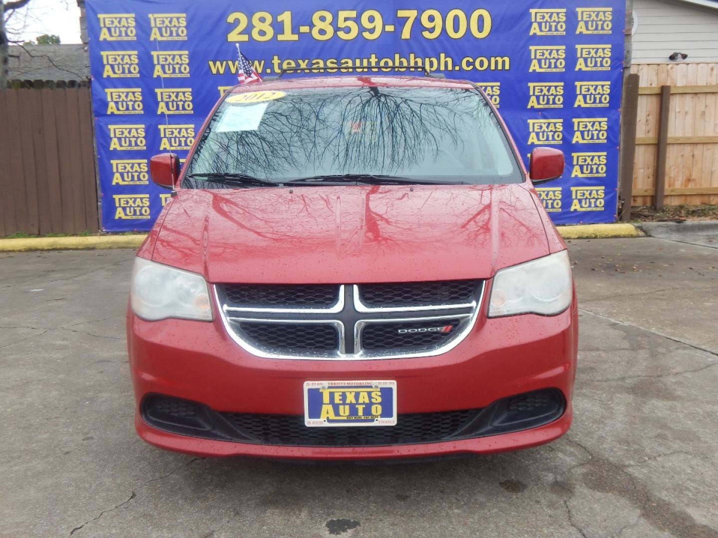 2012 RED Dodge Grand Caravan SXT (2C4RDGCG7CR) with an 3.6L V6 DOHC 24V engine, 6-Speed Automatic transmission, located at 16710 Clay Rd., Houston, TX, 77084, (281) 859-7900, 0.000000, 0.000000 - Low Donw. Low Payments. - Photo#1