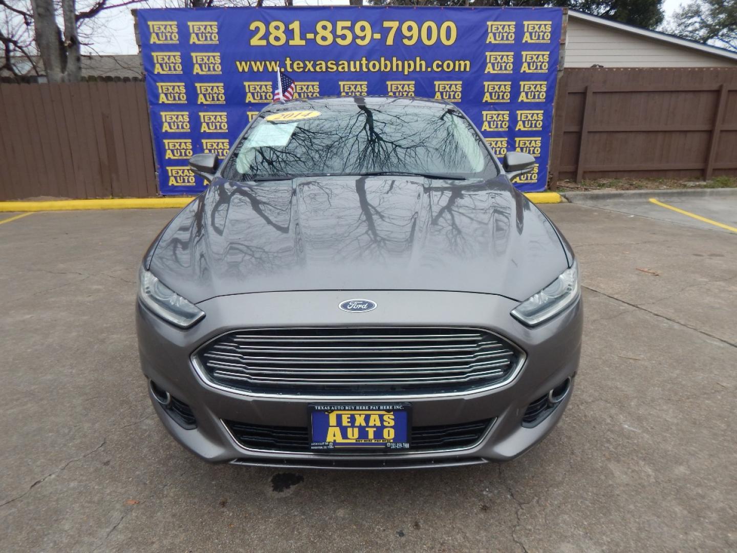 2014 GRAY Ford Fusion Titanium (3FA6P0K99ER) with an 2.0L L4 DOHC 16V engine, located at 16710 Clay Rd., Houston, TX, 77084, (281) 859-7900, 0.000000, 0.000000 - Low Donw. Low Payments. - Photo#1