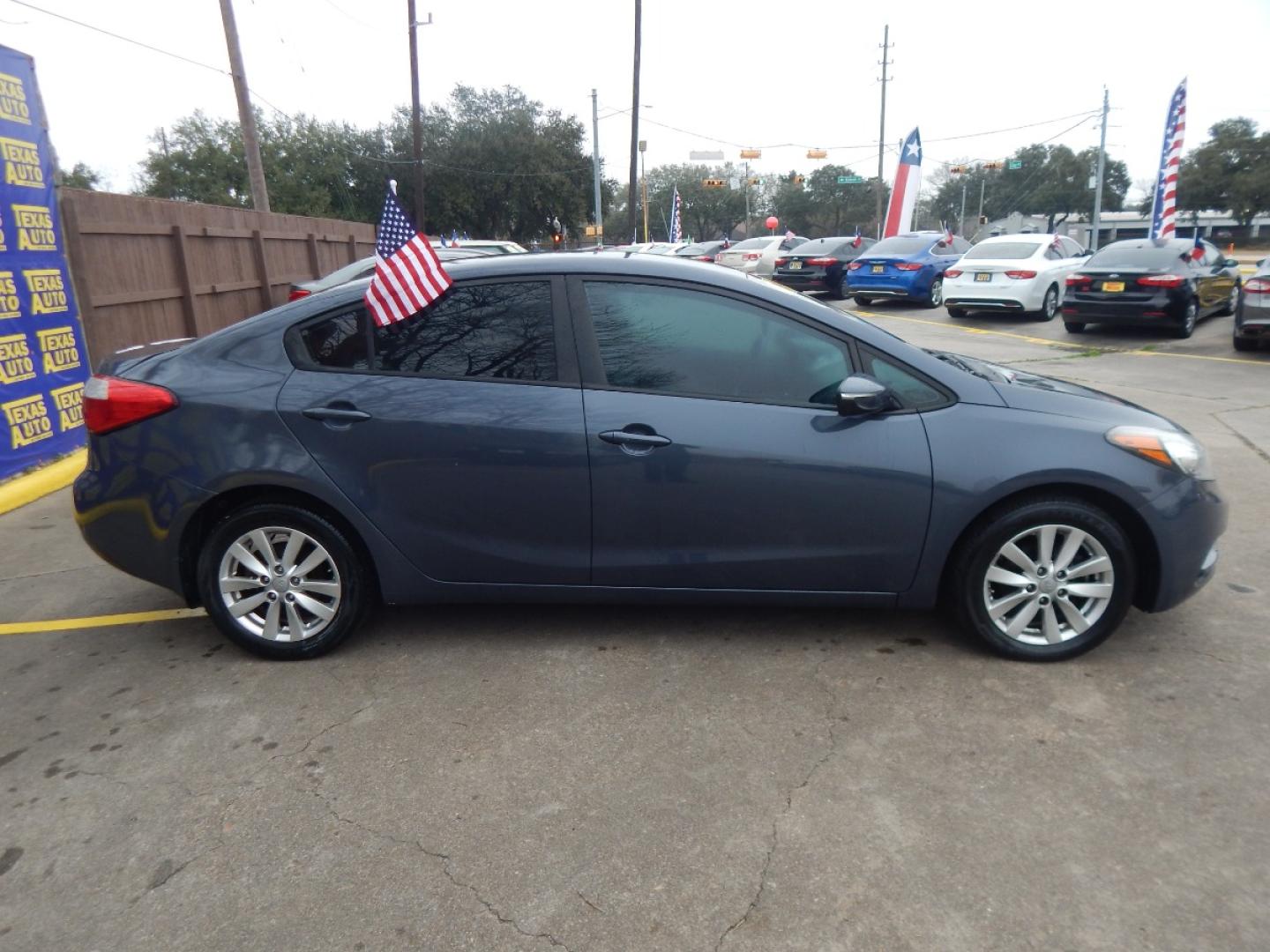 2014 BLUE Kia Forte EX (KNAFX4A68E5) with an 1.8L L4 DOHC 16V engine, 6-Speed Automatic transmission, located at 16710 Clay Rd., Houston, TX, 77084, (281) 859-7900, 0.000000, 0.000000 - Low Donw. Low Payments. - Photo#4