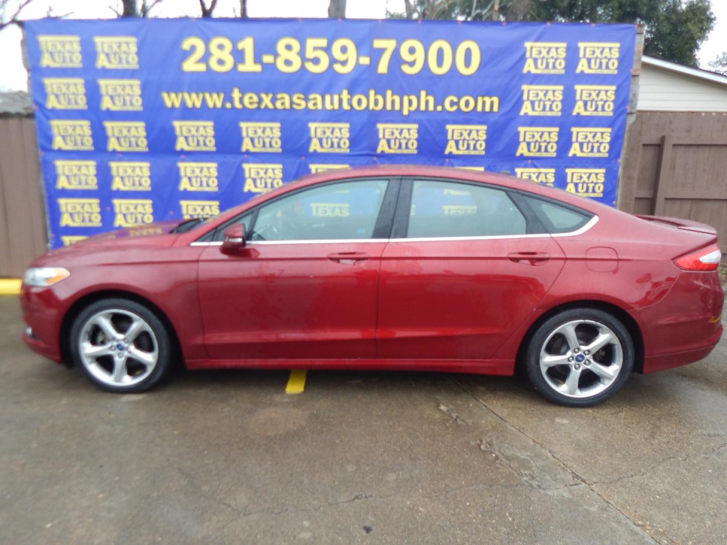 2013 RED Ford Fusion SE (3FA6P0HR6DR) with an 1.6L L4 DOHC 16V engine, located at 16710 Clay Rd., Houston, TX, 77084, (281) 859-7900, 0.000000, 0.000000 - Low Donw. Low Payments. - Photo#0