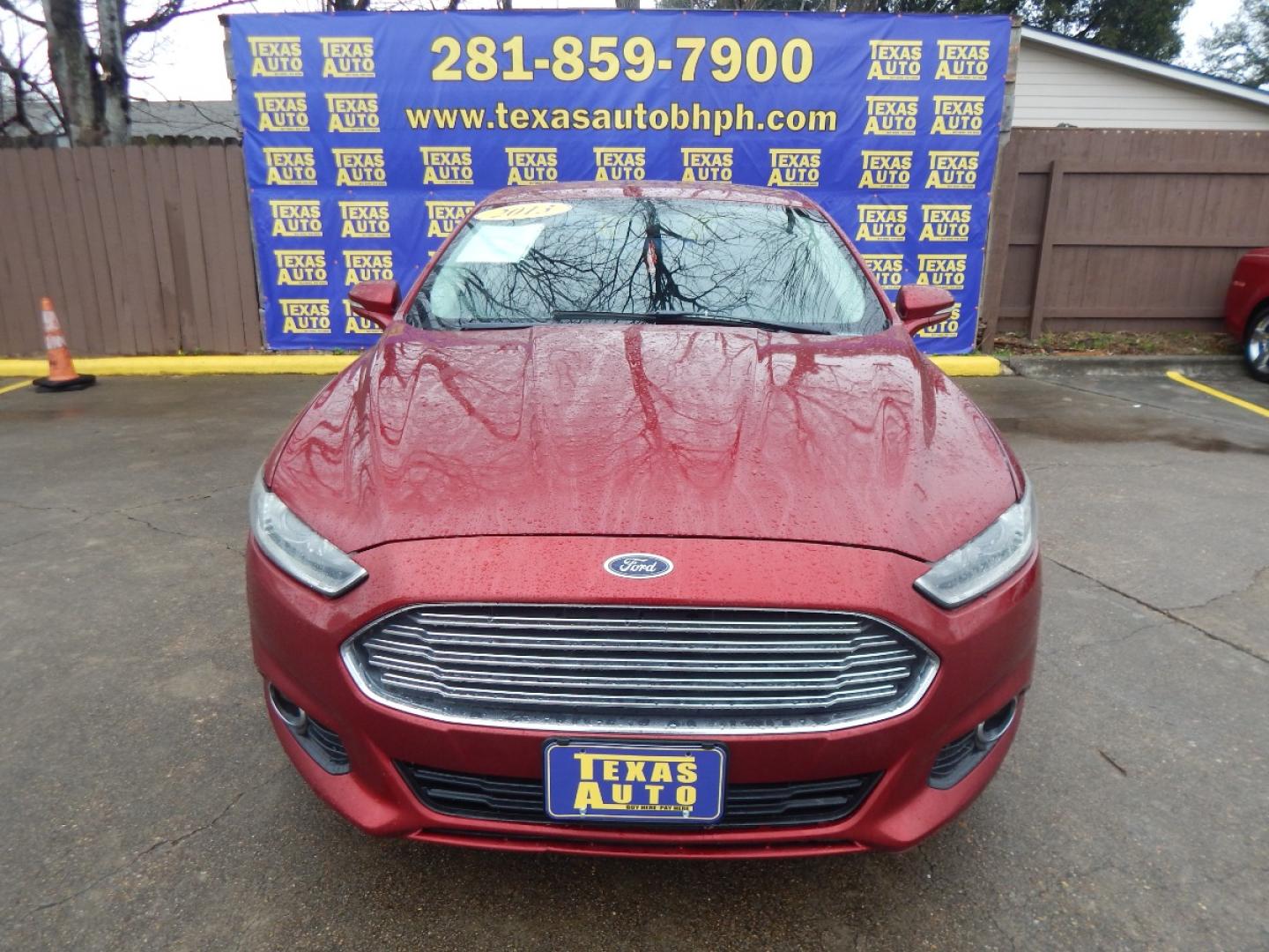 2013 RED Ford Fusion SE (3FA6P0HR6DR) with an 1.6L L4 DOHC 16V engine, located at 16710 Clay Rd., Houston, TX, 77084, (281) 859-7900, 0.000000, 0.000000 - Low Donw. Low Payments. - Photo#1