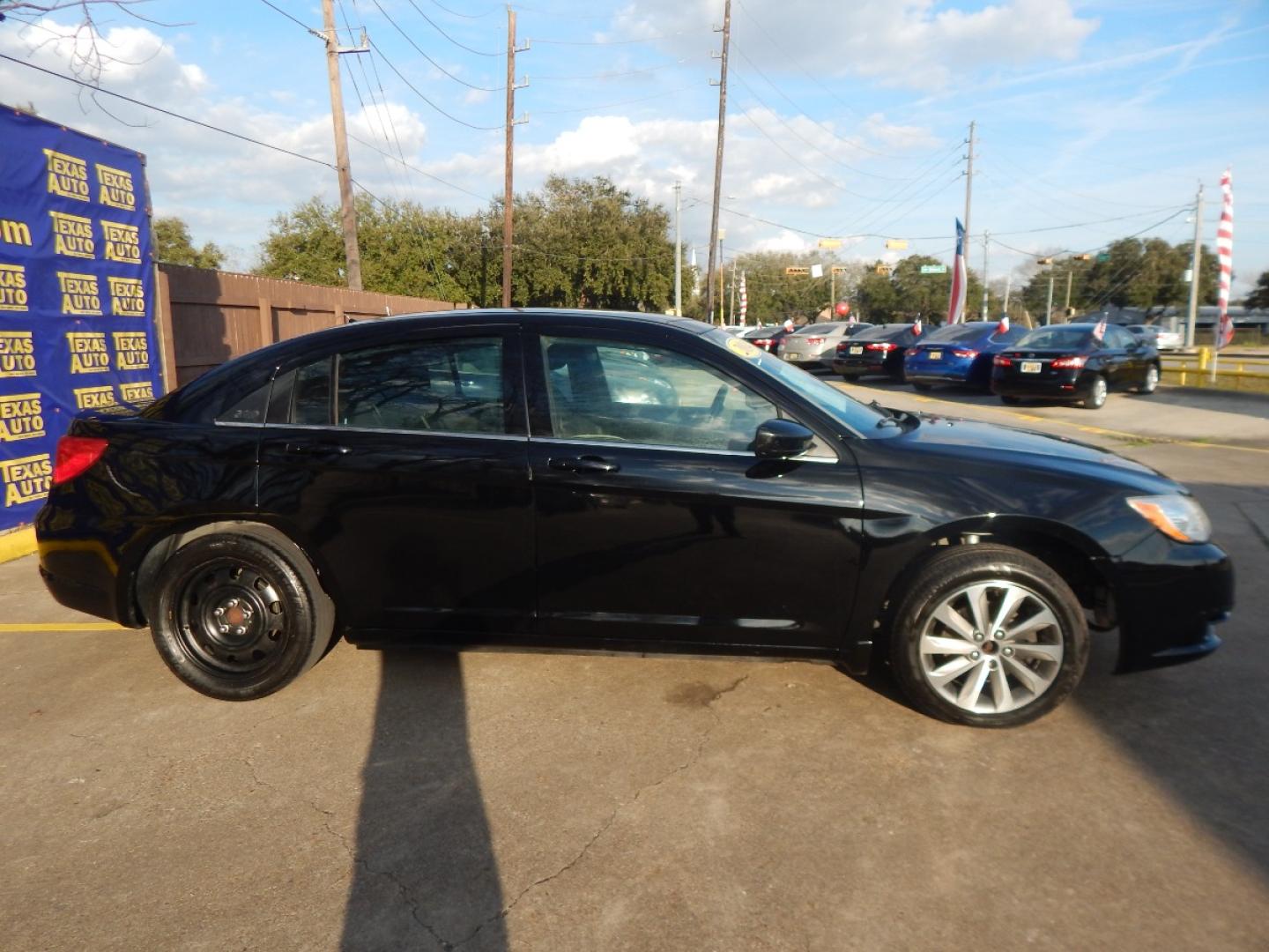 2014 BLACK Chrysler 200 LX (1C3CCBAB0EN) with an 2.4L L4 DOHC 16V engine, 6-Speed Automatic transmission, located at 16710 Clay Rd., Houston, TX, 77084, (281) 859-7900, 0.000000, 0.000000 - Low Down. Low Payments. - Photo#4