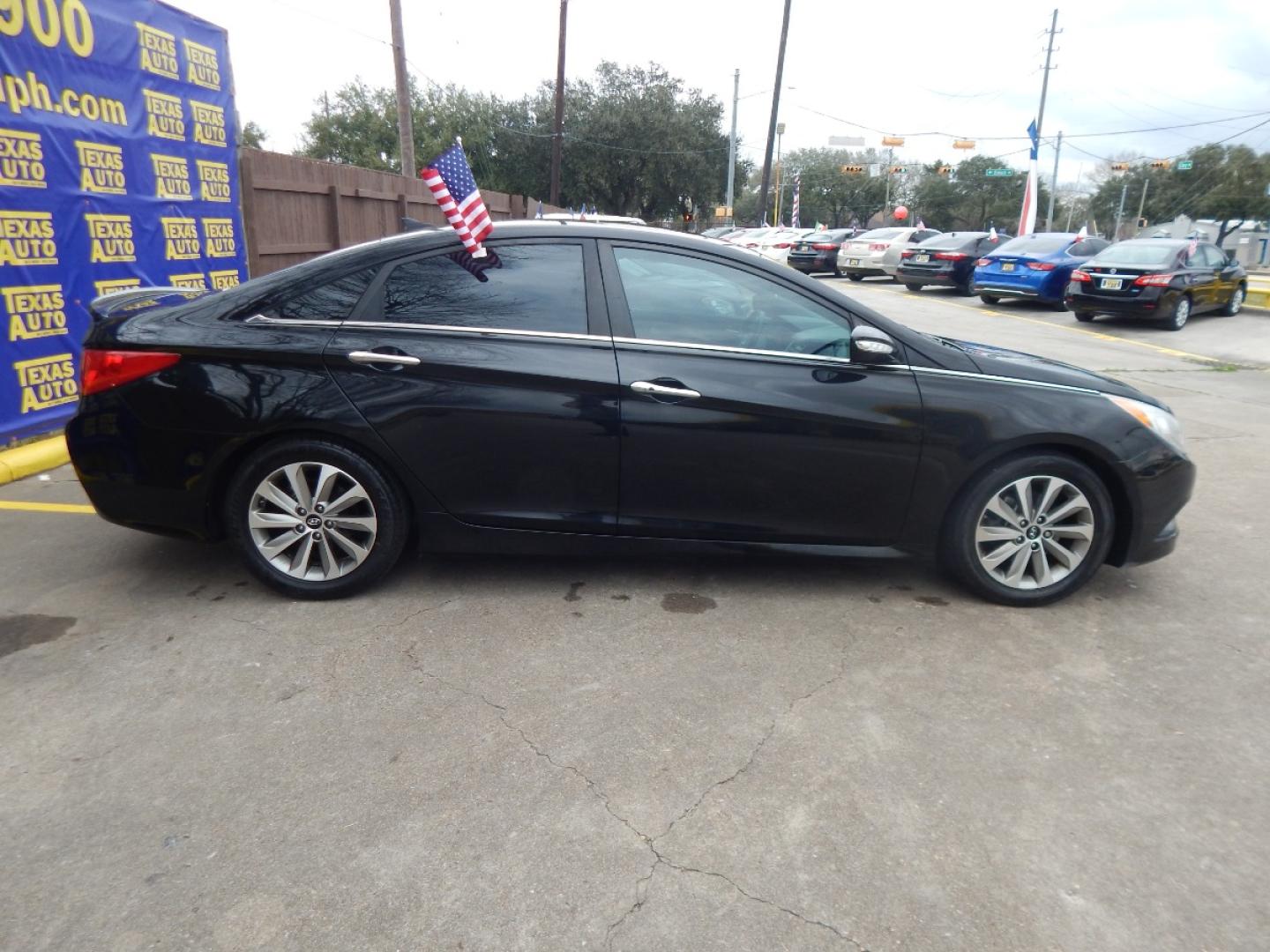 2014 BLACK Hyundai Sonata Limited Auto (5NPEC4AC7EH) with an 2.4L L4 DOHC 16V engine, 6-Speed Automatic transmission, located at 16710 Clay Rd., Houston, TX, 77084, (281) 859-7900, 0.000000, 0.000000 - Low Down. Low Payments. - Photo#4