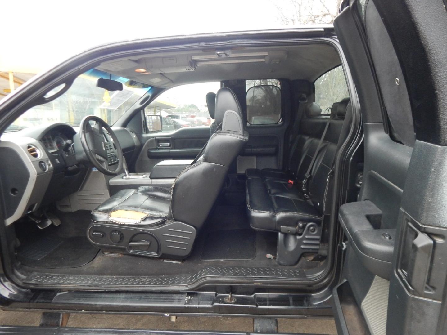 2004 BLACK Ford F-150 FX4 SuperCab 4WD (1FTPX14554N) with an 5.4L V6 SOHC 16V engine, 4-Speed Automatic Overdrive transmission, located at 16710 Clay Rd., Houston, TX, 77084, (281) 859-7900, 0.000000, 0.000000 - Cash. - Photo#7