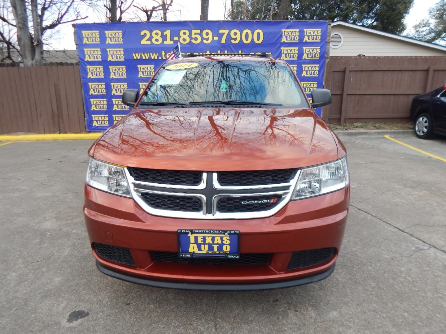 2014 ORANGE Dodge Journey SE (3C4PDCAB8ET) with an 2.4L L4 DOHC 16V engine, 4-Speed Automatic transmission, located at 16710 Clay Rd., Houston, TX, 77084, (281) 859-7900, 0.000000, 0.000000 - Low Down. Low Payments. - Photo#1