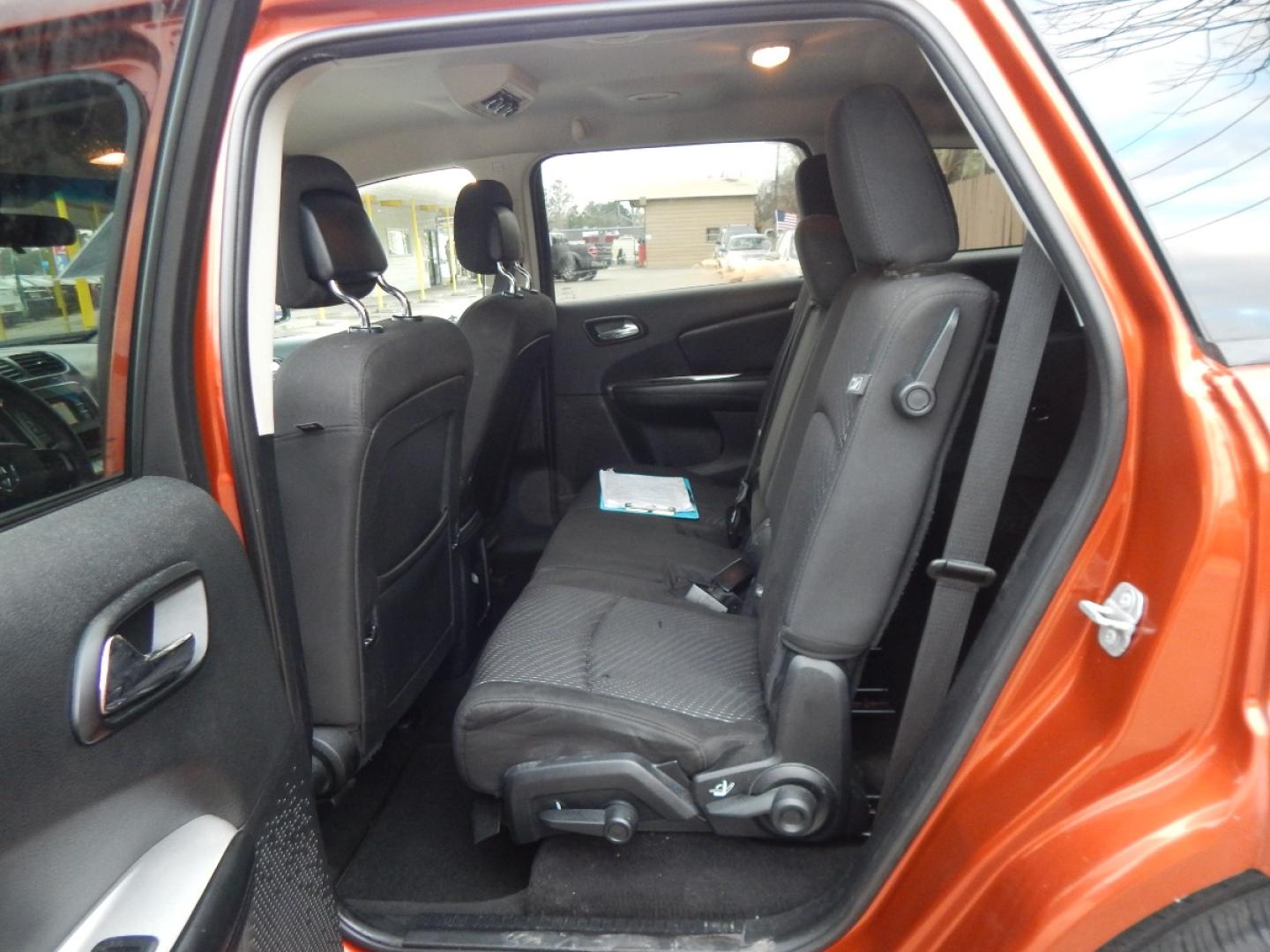 2014 ORANGE Dodge Journey SE (3C4PDCAB8ET) with an 2.4L L4 DOHC 16V engine, 4-Speed Automatic transmission, located at 16710 Clay Rd., Houston, TX, 77084, (281) 859-7900, 0.000000, 0.000000 - Low Down. Low Payments. - Photo#7