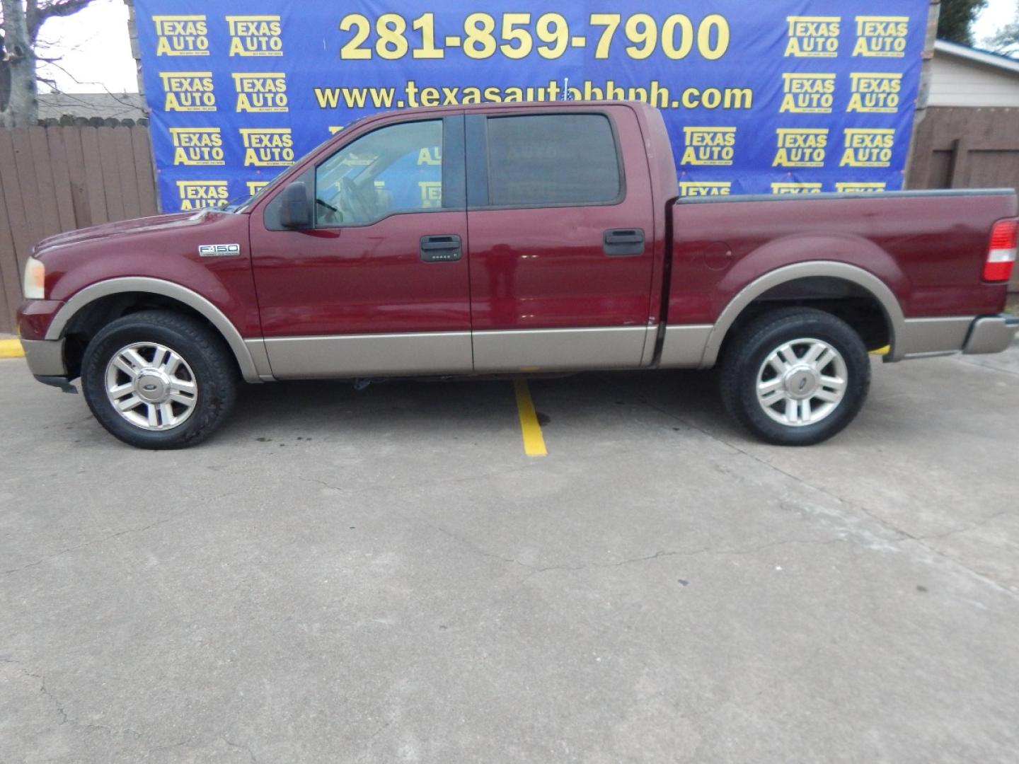 2005 MAROON Ford F-150 Lariat SuperCrew 2WD (1FTPW12555K) with an 5.4L V6 SOHC 16V engine, 4-Speed Automatic Overdrive transmission, located at 16710 Clay Rd., Houston, TX, 77084, (281) 859-7900, 0.000000, 0.000000 - Low Down. Low Payments. - Photo#0