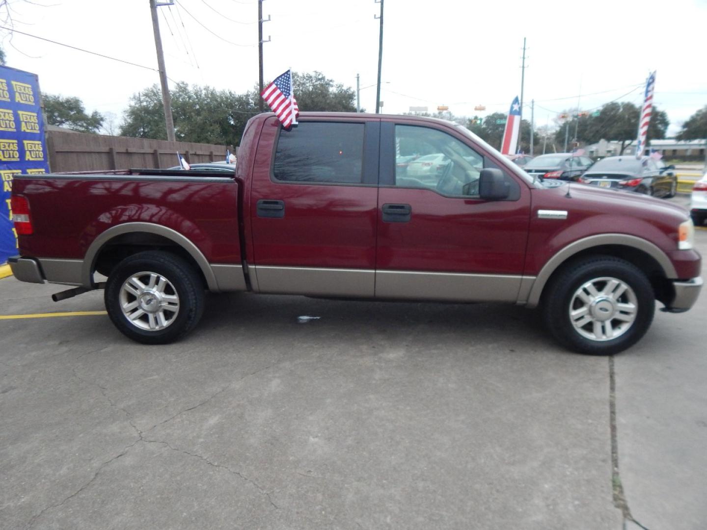 2005 MAROON Ford F-150 Lariat SuperCrew 2WD (1FTPW12555K) with an 5.4L V6 SOHC 16V engine, 4-Speed Automatic Overdrive transmission, located at 16710 Clay Rd., Houston, TX, 77084, (281) 859-7900, 0.000000, 0.000000 - Low Down. Low Payments. - Photo#4