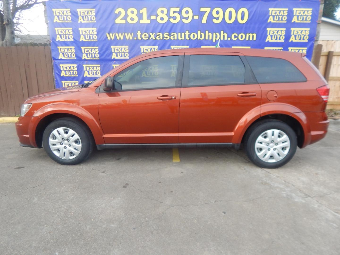 2014 ORANGE DODGE JOURNEY SE (3C4PDCAB7ET) with an 2.4L L4 DOHC 16V engine, 4-SPEED AUTOMATIC transmission, located at 16710 Clay Rd., Houston, TX, 77084, (281) 859-7900, 0.000000, 0.000000 - Low Donw. Low Payments. - Photo#0