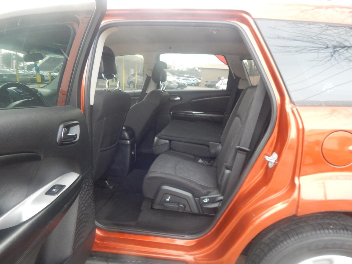 2014 ORANGE DODGE JOURNEY SE (3C4PDCAB7ET) with an 2.4L L4 DOHC 16V engine, 4-SPEED AUTOMATIC transmission, located at 16710 Clay Rd., Houston, TX, 77084, (281) 859-7900, 0.000000, 0.000000 - Low Donw. Low Payments. - Photo#7