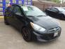 2017 BLACK Hyundai Accent SE 4-Door 6M (KMHCT4AE8HU) with an 1.6L L4 DOHC 16V engine, 6M transmission, located at 16710 Clay Rd., Houston, TX, 77084, (281) 859-7900, 0.000000, 0.000000 - Low Down. Low Payments. - Photo#3