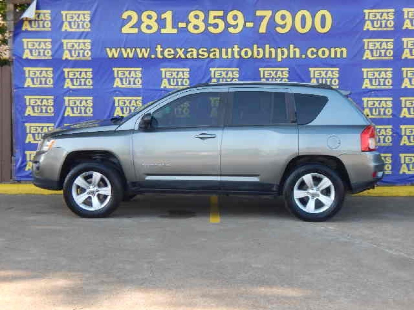 2011 GRAY Jeep Compass Sport 4WD (1J4NF1FBXBD) with an 2.4L L4 DOHC 16V engine, located at 16710 Clay Rd., Houston, TX, 77084, (281) 859-7900, 0.000000, 0.000000 - Low Down. Low Payments. - Photo#0