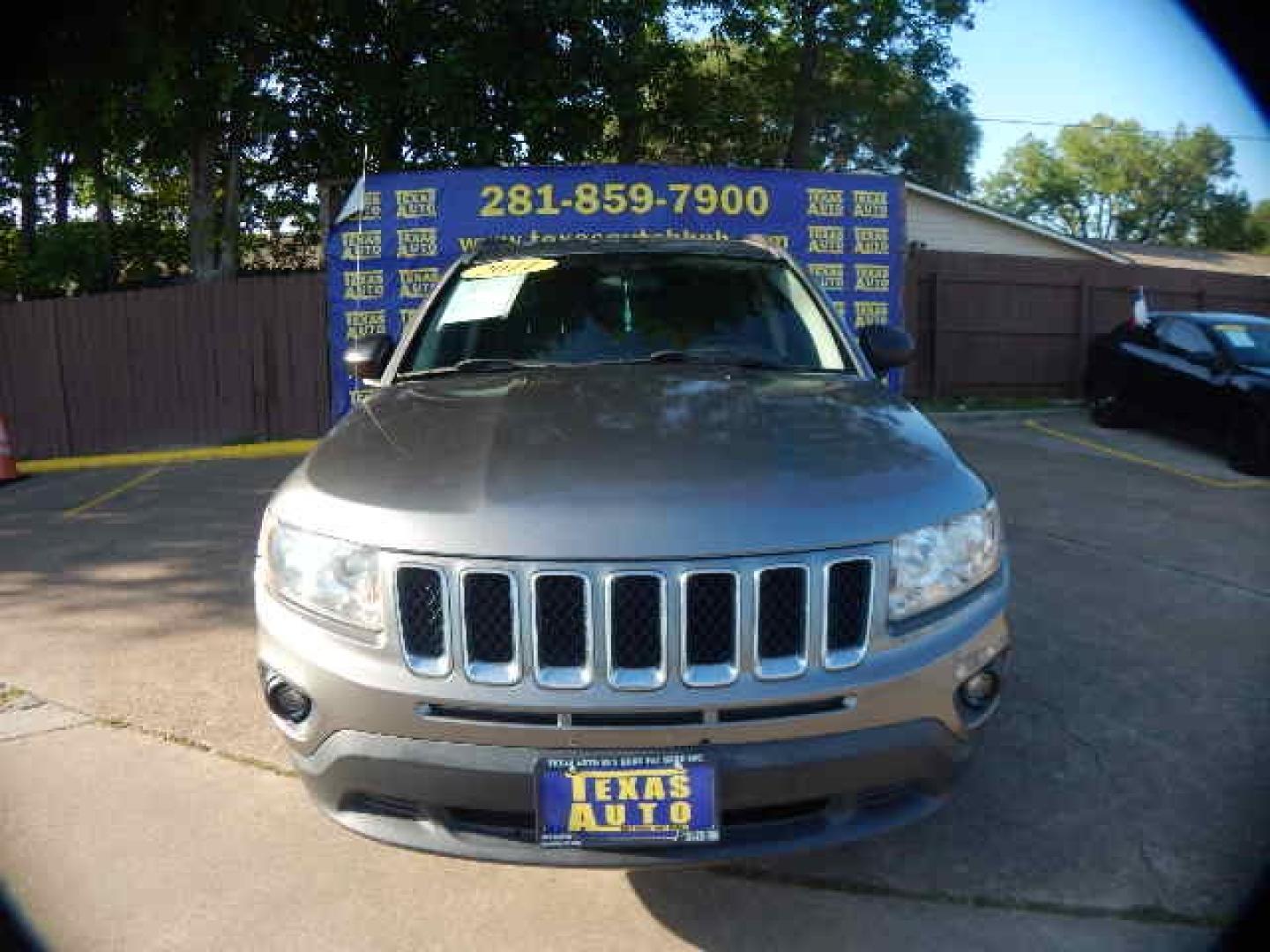 2011 GRAY Jeep Compass Sport 4WD (1J4NF1FBXBD) with an 2.4L L4 DOHC 16V engine, located at 16710 Clay Rd., Houston, TX, 77084, (281) 859-7900, 0.000000, 0.000000 - Low Down. Low Payments. - Photo#1