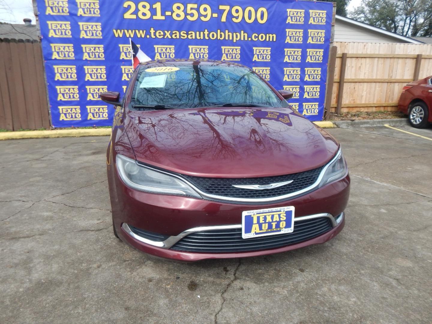 2016 RED CHRYSLER 200 Limited (1C3CCCAB2GN) with an 2.4L L4 DOHC 16V engine, 9-SPEED AUTOMATIC transmission, located at 16710 Clay Rd., Houston, TX, 77084, (281) 859-7900, 0.000000, 0.000000 - Low Donw. Low Payments. - Photo#2