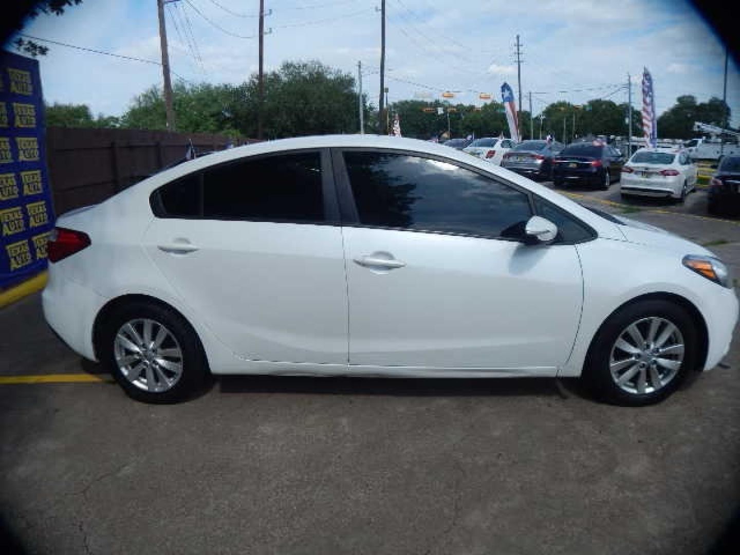 2015 WHITE Kia Forte EX (KNAFX4A61F5) with an 1.8L L4 DOHC 16V engine, 6-Speed Automatic transmission, located at 16710 Clay Rd., Houston, TX, 77084, (281) 859-7900, 0.000000, 0.000000 - Low Down. Low Payments. - Photo#4