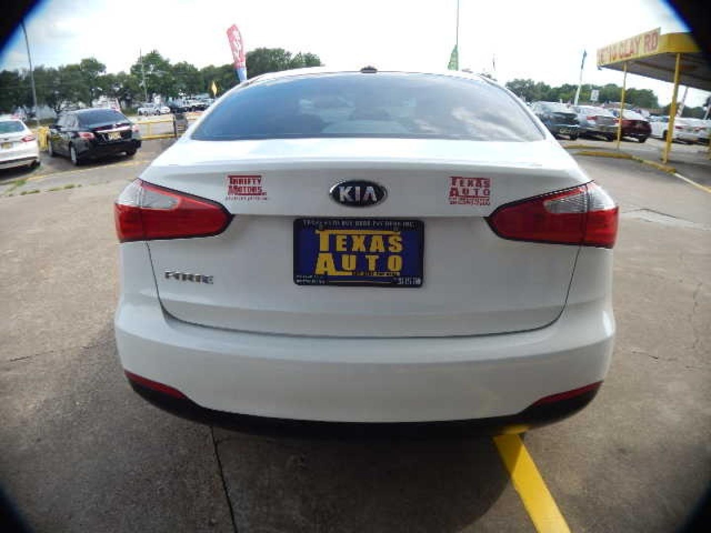 2015 WHITE Kia Forte EX (KNAFX4A61F5) with an 1.8L L4 DOHC 16V engine, 6-Speed Automatic transmission, located at 16710 Clay Rd., Houston, TX, 77084, (281) 859-7900, 0.000000, 0.000000 - Low Down. Low Payments. - Photo#5