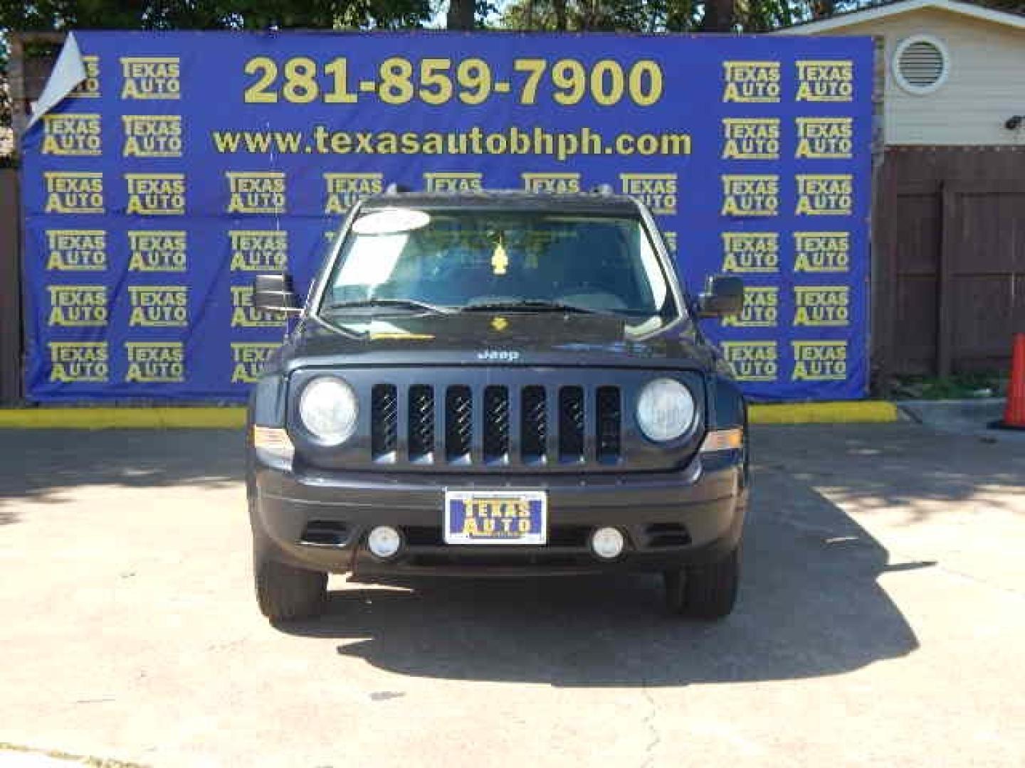 2014 BLACK Jeep Patriot Latitude 2WD (1C4NJPFA4ED) with an 2.0L L4 DOHC 16V engine, located at 16710 Clay Rd., Houston, TX, 77084, (281) 859-7900, 0.000000, 0.000000 - Low Down. Low Payments. - Photo#1