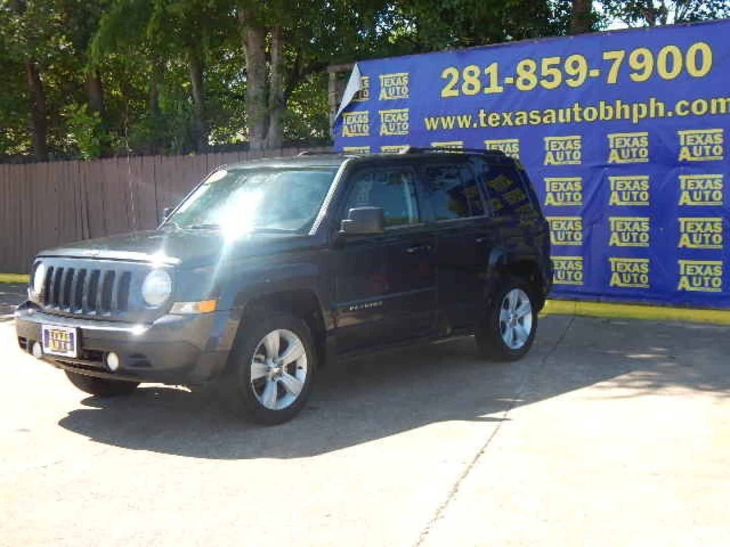 2014 BLACK Jeep Patriot Latitude 2WD (1C4NJPFA4ED) with an 2.0L L4 DOHC 16V engine, located at 16710 Clay Rd., Houston, TX, 77084, (281) 859-7900, 0.000000, 0.000000 - Low Down. Low Payments. - Photo#2