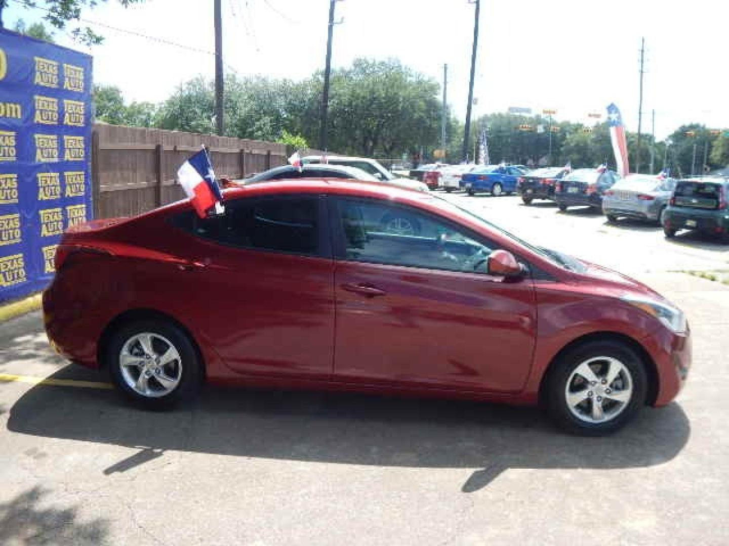 2014 RED Hyundai Elantra Limited (5NPDH4AE0EH) with an 1.8L L4 DOHC 16V engine, 6-Speed Automatic transmission, located at 16710 Clay Rd., Houston, TX, 77084, (281) 859-7900, 0.000000, 0.000000 - Low Down. Low Payments. - Photo#4