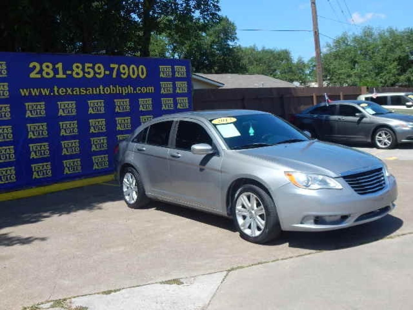 2013 GRAY Chrysler 200 LX (1C3CCBAB4DN) with an 2.4L L4 DOHC 16V engine, 6-Speed Automatic transmission, located at 16710 Clay Rd., Houston, TX, 77084, (281) 859-7900, 0.000000, 0.000000 - Low Down. Low Payments. - Photo#3