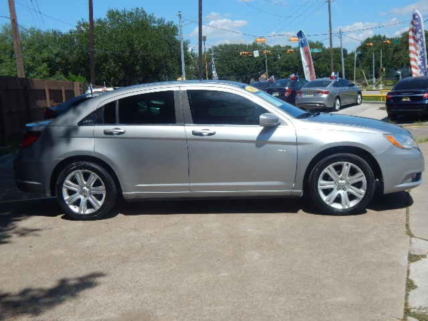 2013 GRAY Chrysler 200 LX (1C3CCBAB4DN) with an 2.4L L4 DOHC 16V engine, 6-Speed Automatic transmission, located at 16710 Clay Rd., Houston, TX, 77084, (281) 859-7900, 0.000000, 0.000000 - Low Down. Low Payments. - Photo#4