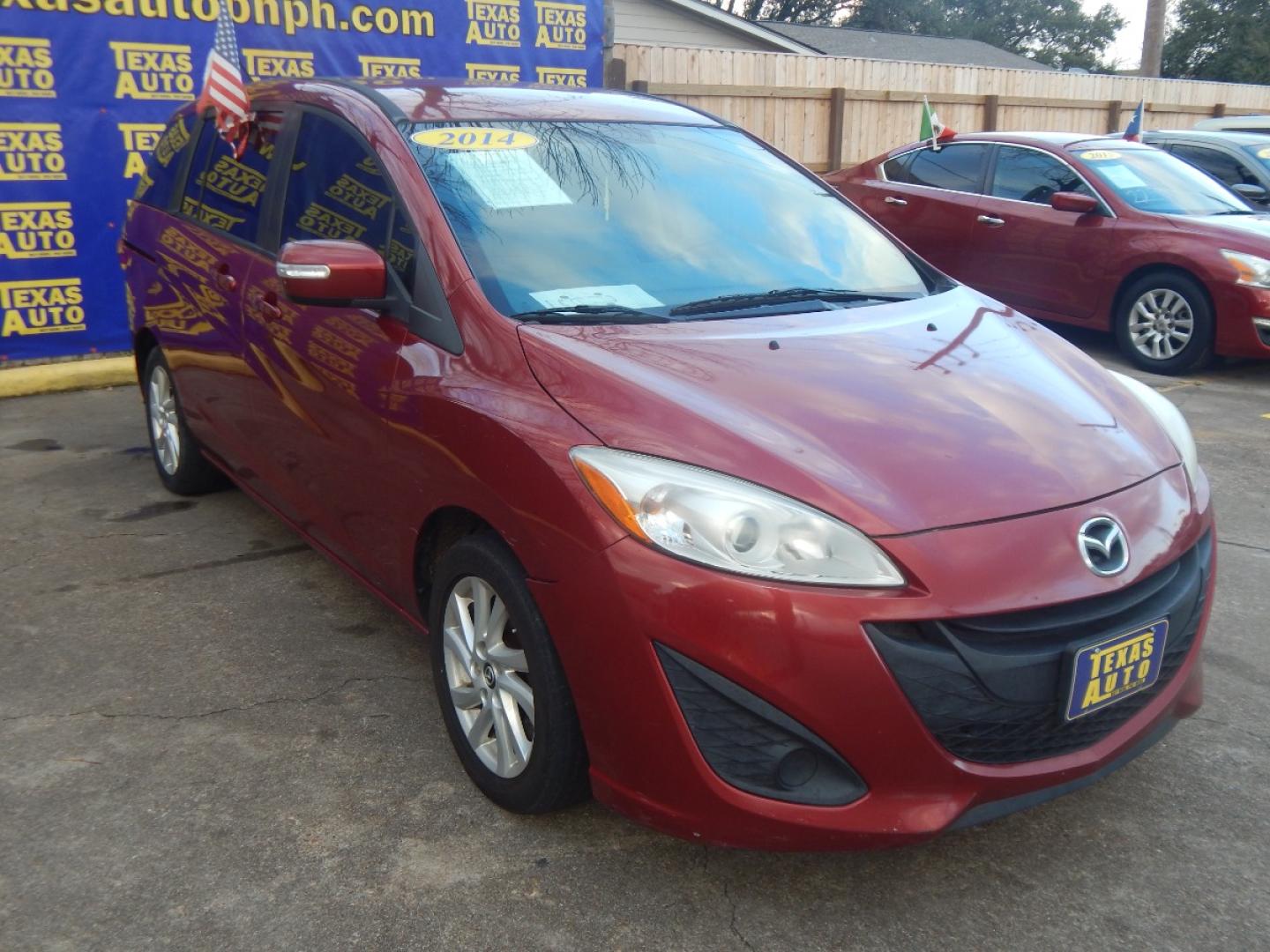 2014 RED MAZDA MAZDA5 Sport AT (JM1CW2BL6E0) with an 2.5L L4 DOHC 16V engine, 5-SPEED AUTOMATIC transmission, located at 16710 Clay Rd., Houston, TX, 77084, (281) 859-7900, 0.000000, 0.000000 - Low Donw. Low Payments. - Photo#3