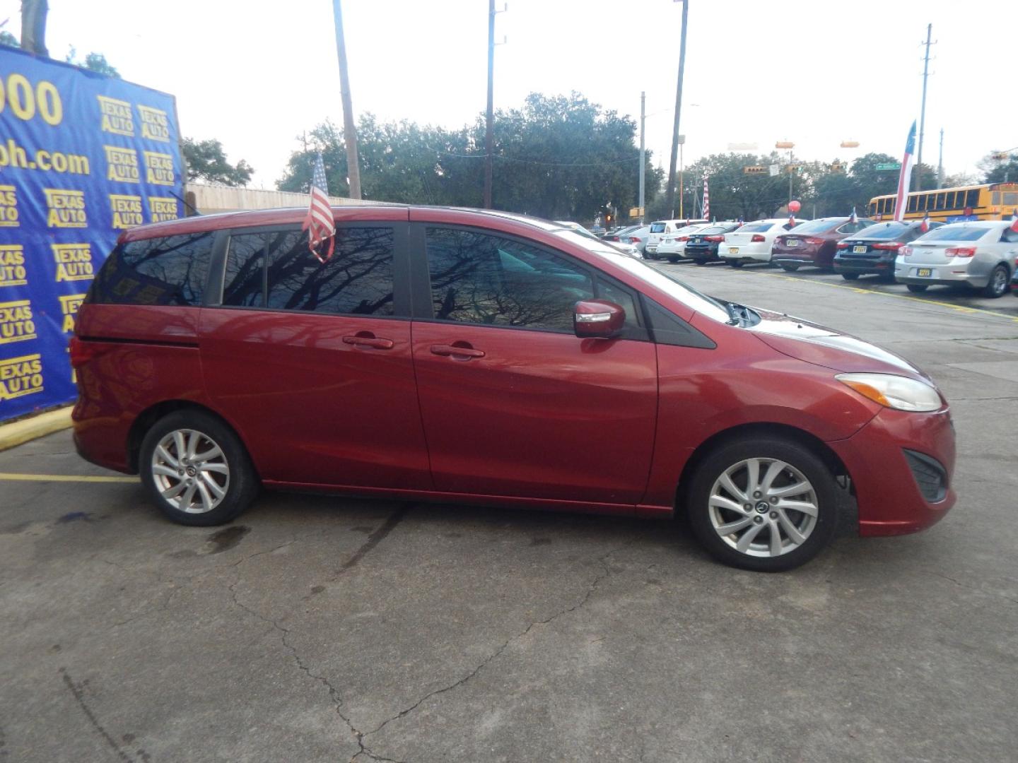 2014 RED MAZDA MAZDA5 Sport AT (JM1CW2BL6E0) with an 2.5L L4 DOHC 16V engine, 5-SPEED AUTOMATIC transmission, located at 16710 Clay Rd., Houston, TX, 77084, (281) 859-7900, 0.000000, 0.000000 - Low Donw. Low Payments. - Photo#4