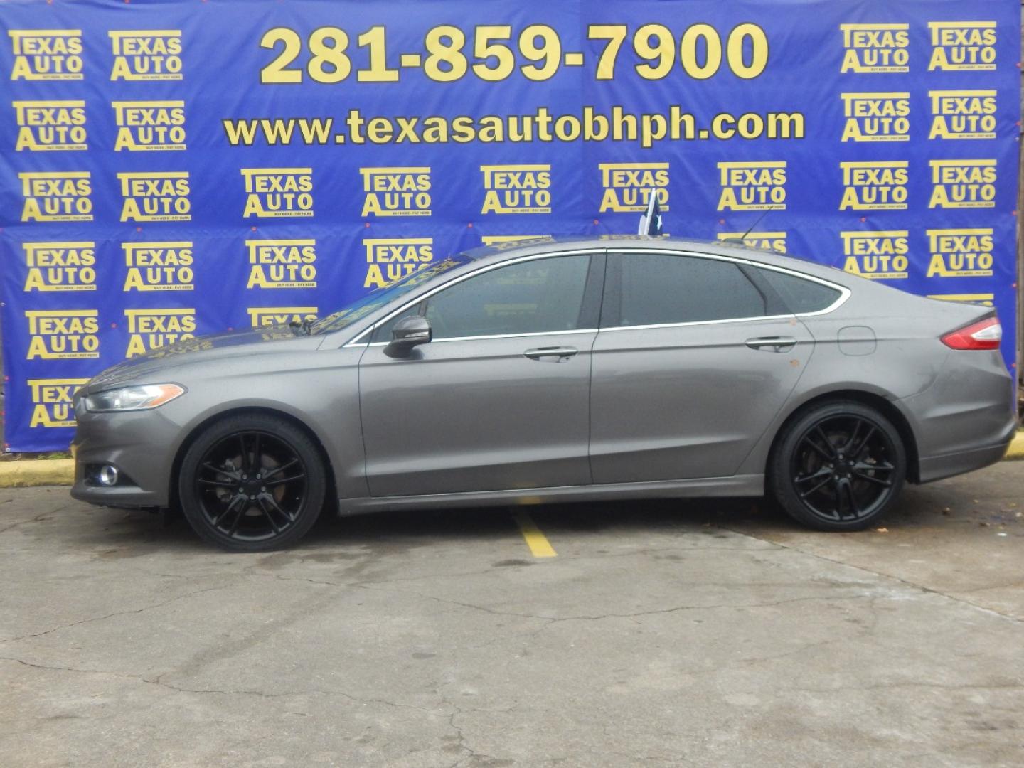 2013 GRAY FORD FUSION Titanium (3FA6P0K95DR) with an 2.0L L4 DOHC 16V engine, AUTOMATIC transmission, located at 16710 Clay Rd., Houston, TX, 77084, (281) 859-7900, 0.000000, 0.000000 - Low Donw. Low Payments. - Photo#0