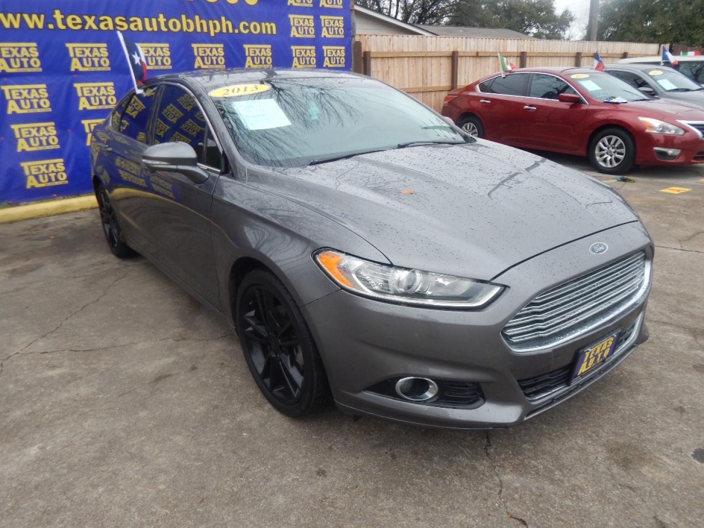 2013 GRAY FORD FUSION Titanium (3FA6P0K95DR) with an 2.0L L4 DOHC 16V engine, AUTOMATIC transmission, located at 16710 Clay Rd., Houston, TX, 77084, (281) 859-7900, 0.000000, 0.000000 - Low Donw. Low Payments. - Photo#3