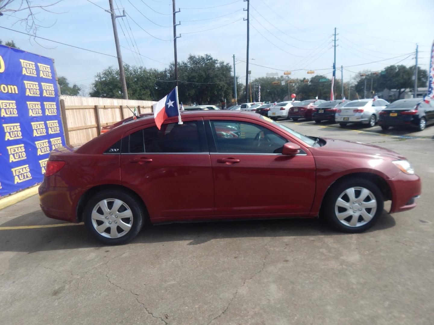 2014 RED CHRYSLER 200 LX (1C3CCBAB7EN) with an 2.4L L4 DOHC 16V engine, 6-SPEED AUTOMATIC transmission, located at 16710 Clay Rd., Houston, TX, 77084, (281) 859-7900, 0.000000, 0.000000 - Low Donw. Low Payments. - Photo#4