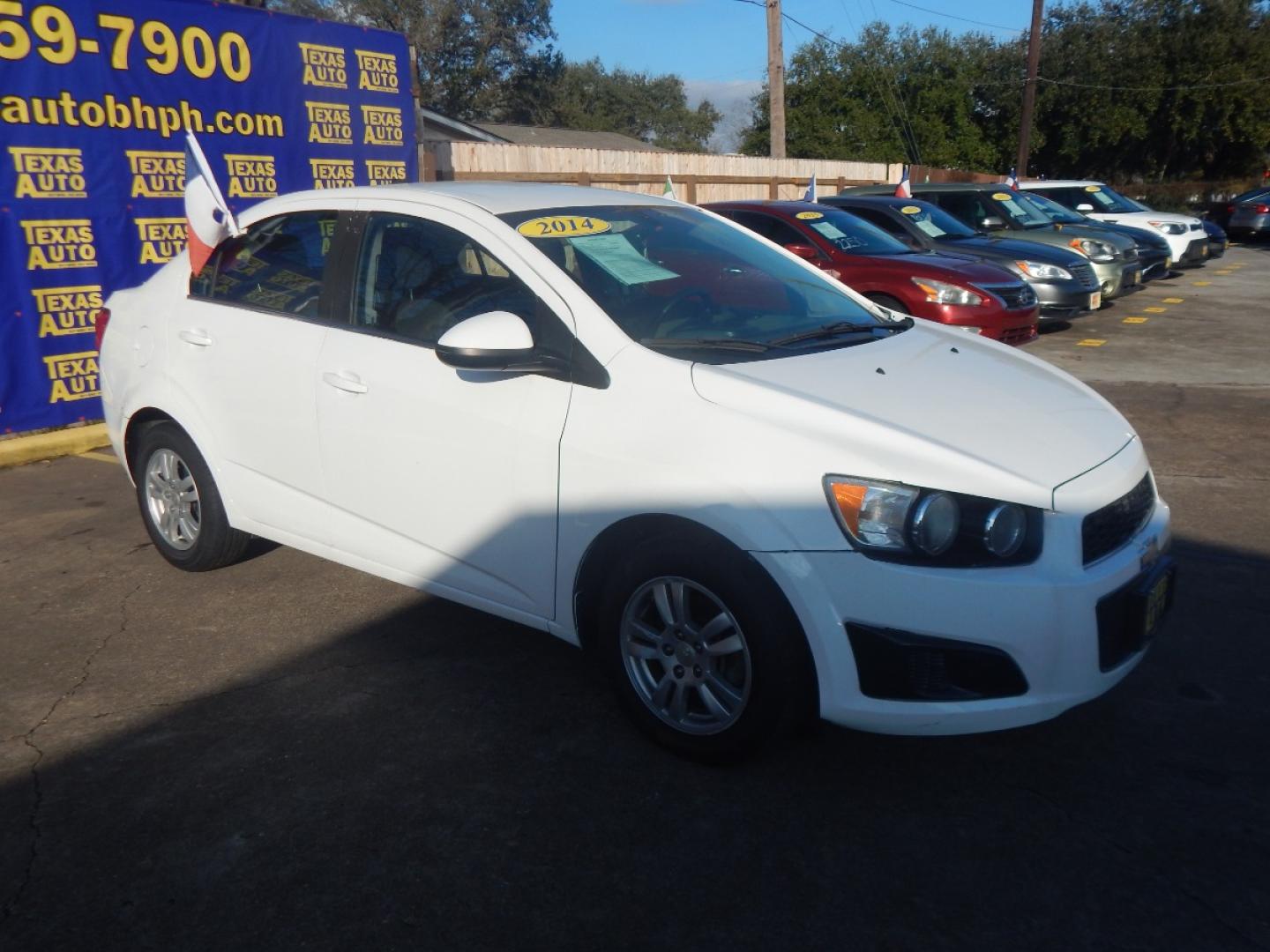 2014 WHITE CHEVROLET SONIC LT Auto Sedan (1G1JC5SH6E4) with an 1.8L L4 DOHC 24V engine, 6-SPEED AUTOMATIC transmission, located at 16710 Clay Rd., Houston, TX, 77084, (281) 859-7900, 0.000000, 0.000000 - Low Donw. Low Payments. - Photo#3