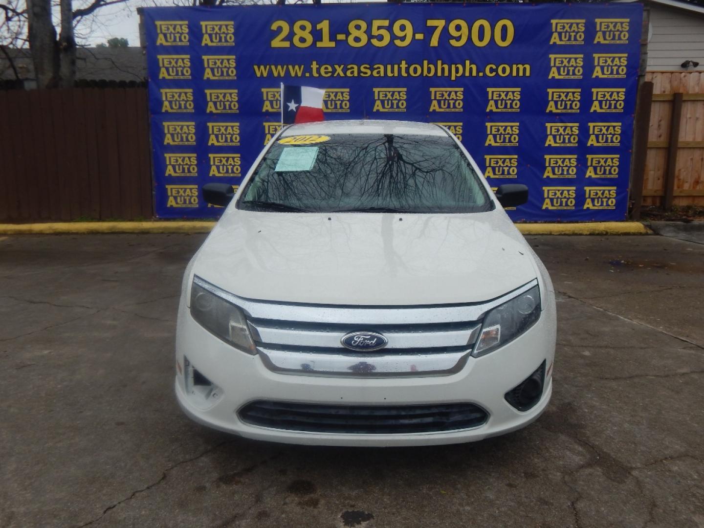 2012 WHITE FORD FUSION S (3FAHP0GA2CR) with an 2.5L L4 DOHC 16V engine, 5-SPEED AUTOMATIC OR 5-SPEED MANUAL transmission, located at 16710 Clay Rd., Houston, TX, 77084, (281) 859-7900, 0.000000, 0.000000 - Low Donw. Low Payments. - Photo#2