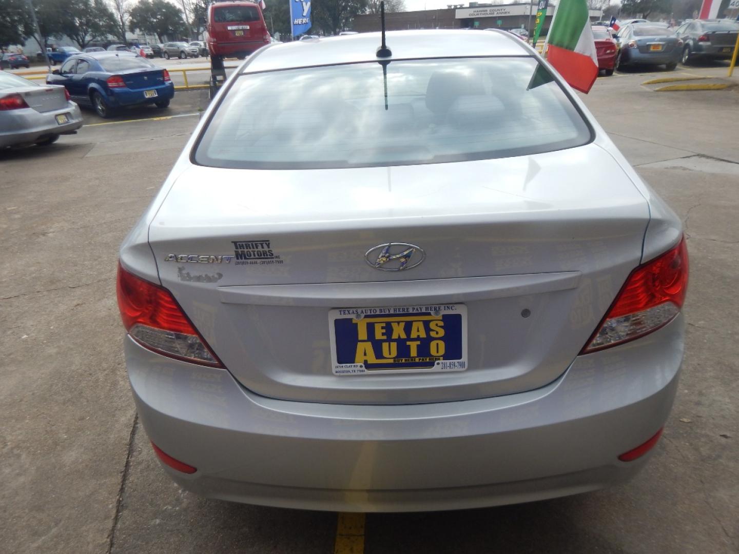 2013 SILVER HYUNDAI ACCENT GLS 4-Door (KMHCT4AE8DU) with an 1.6L L4 DOHC 16V engine, AUTOMATIC transmission, located at 16710 Clay Rd., Houston, TX, 77084, (281) 859-7900, 0.000000, 0.000000 - Low Donw. Low Payments. - Photo#5