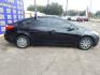 2015 BLACK KIA FORTE EX (KNAFX4A63F5) with an 1.8L L4 DOHC 16V engine, 6-SPEED AUTOMATIC transmission, located at 16710 Clay Rd., Houston, TX, 77084, (281) 859-7900, 0.000000, 0.000000 - Low Donw. Low Payments. - Photo#4