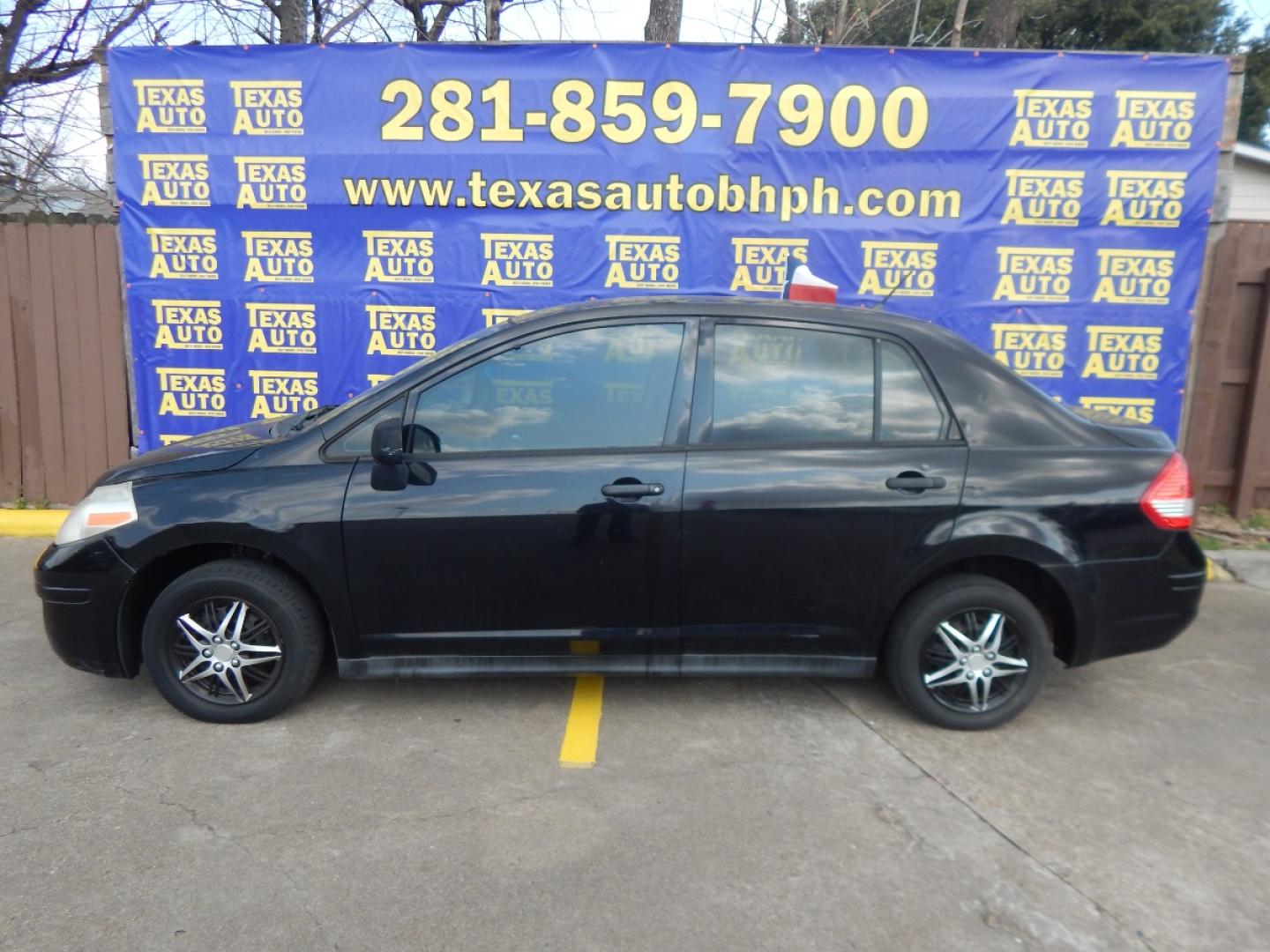 2009 BLACK NISSAN VERSA 1.6 Base Sedan (3N1CC11E99L) with an 1.6L L4 DOHC 16V engine, 5-SPEED MANUAL transmission, located at 16710 Clay Rd., Houston, TX, 77084, (281) 859-7900, 0.000000, 0.000000 - Cash. - Photo#0