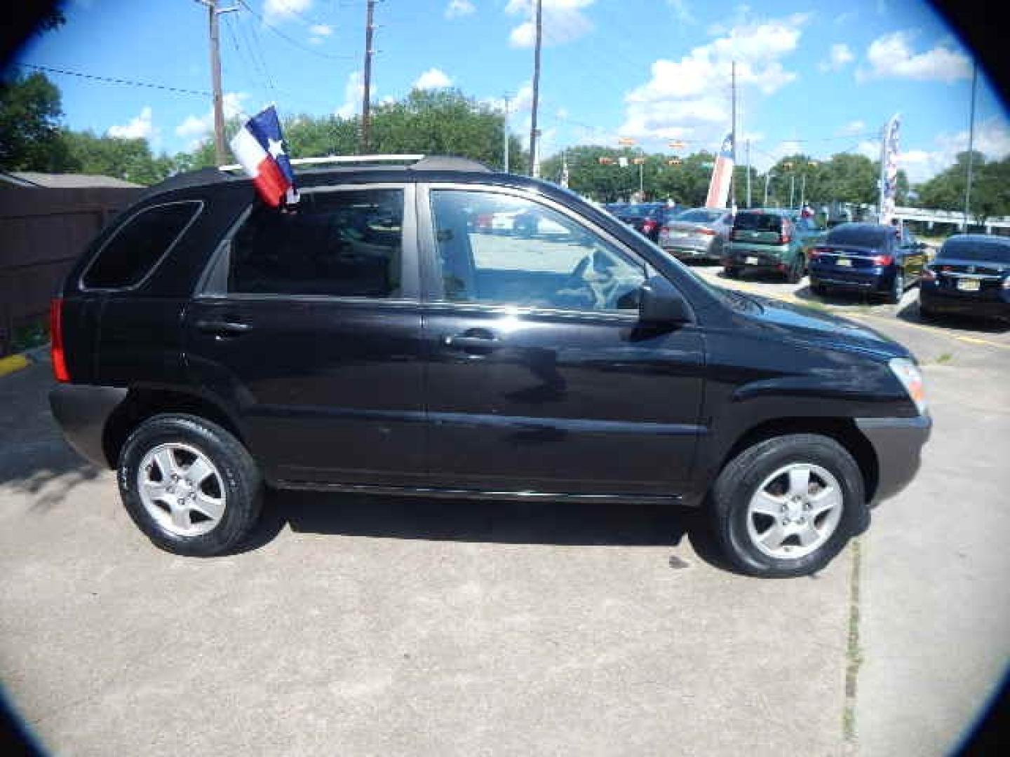 2008 BLACK KIA SPORTAGE LX I4 2WD (KNDJF724387) with an 2.0L L4 DOHC 16V engine, 4-SPEED AUTOMATIC OR 5-SPEED MANUAL transmission, located at 16710 Clay Rd., Houston, TX, 77084, (281) 859-7900, 0.000000, 0.000000 - Low Down. Low Payments. - Photo#4