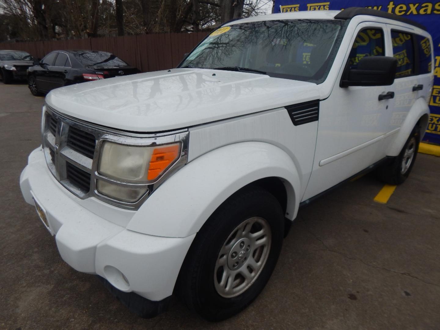 2011 WHITE DODGE NITRO SE 2WD (1D4PT2GK5BW) with an 3.7L V6 SOHC 12V engine, 4-SPEED AUTOMATIC OR 6-SPEED MANUAL transmission, located at 16710 Clay Rd., Houston, TX, 77084, (281) 859-7900, 0.000000, 0.000000 - Low Donw. Low Payments. - Photo#1