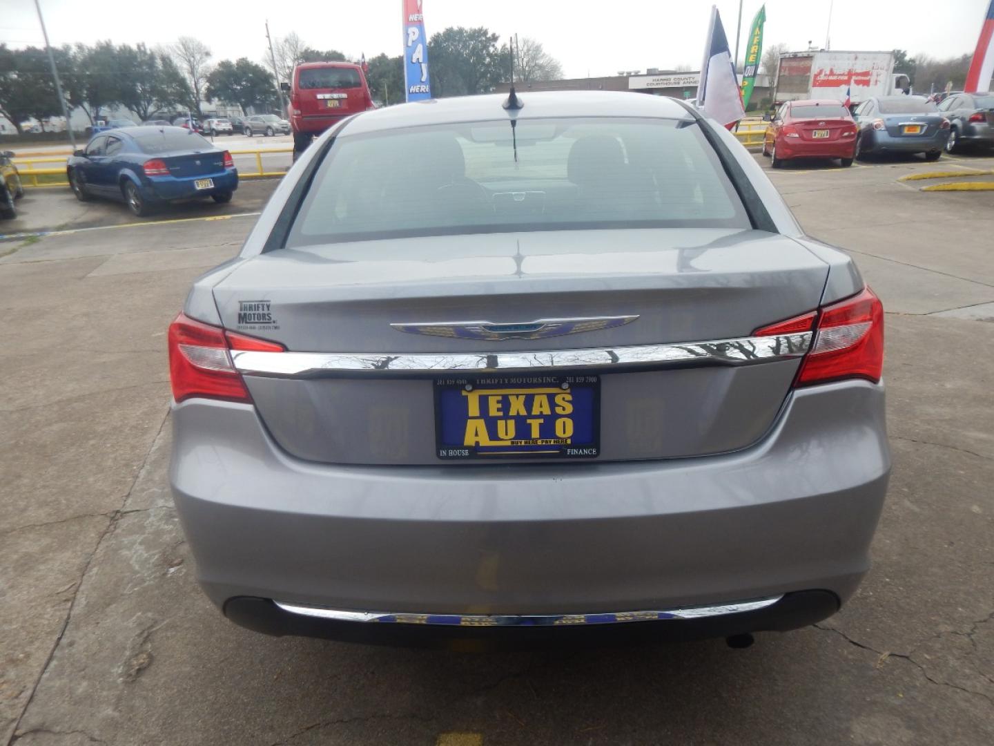 2013 SILVER CHRYSLER 200 LX (1C3CCBABXDN) with an 2.4L L4 DOHC 16V engine, 6-SPEED AUTOMATIC transmission, located at 16710 Clay Rd., Houston, TX, 77084, (281) 859-7900, 0.000000, 0.000000 - Low Donw. Low Payments. - Photo#5