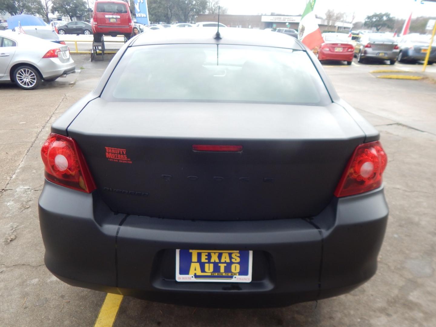 2014 BLACK DODGE AVENGER SE (1C3CDZAB9EN) with an 2.4L L4 DOHC 16V engine, 4-SPEED AUTOMATIC transmission, located at 16710 Clay Rd., Houston, TX, 77084, (281) 859-7900, 0.000000, 0.000000 - Low Donw. Low Payments. - Photo#9