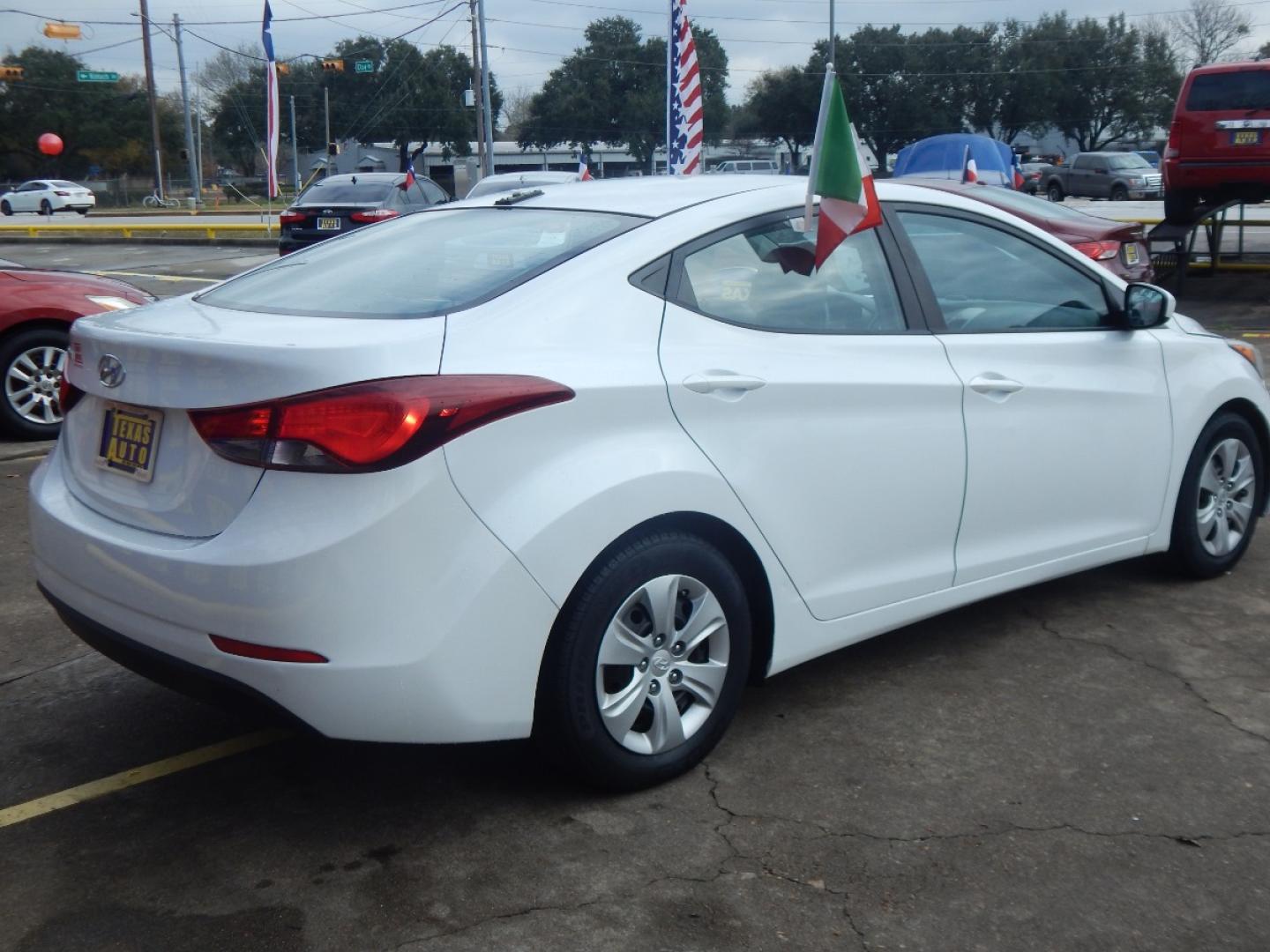 2016 WHITE HYUNDAI ELANTRA Limited (5NPDH4AE1GH) with an 1.8L L4 DOHC 16V engine, 6-SPEED AUTOMATIC transmission, located at 16710 Clay Rd., Houston, TX, 77084, (281) 859-7900, 0.000000, 0.000000 - Low Donw. Low Payments. - Photo#5