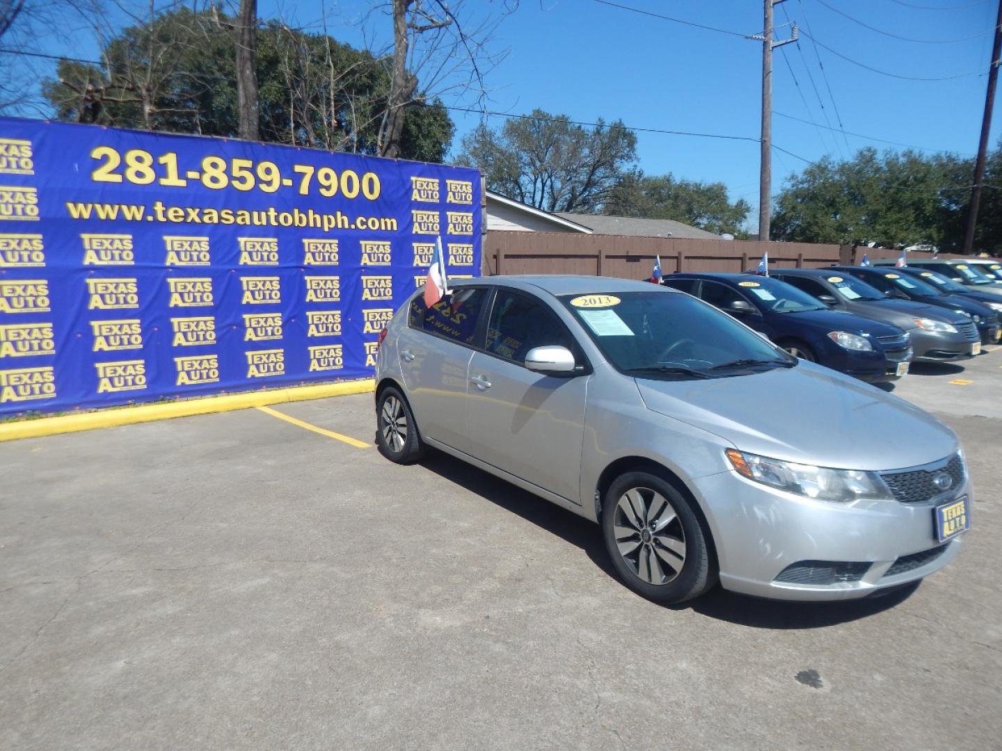 2013 SILVER KIA FORTE 5-DOOR EX (KNAFU5A25D5) with an 2.0L L4 DOHC 16V engine, AUTOMATIC transmission, located at 16710 Clay Rd., Houston, TX, 77084, (281) 859-7900, 0.000000, 0.000000 - Low Down. Low Payments. - Photo#3